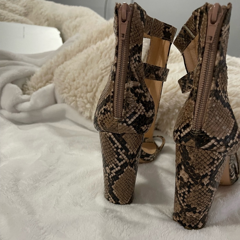 Snake skin heels, front and back zipper, never used, size 8